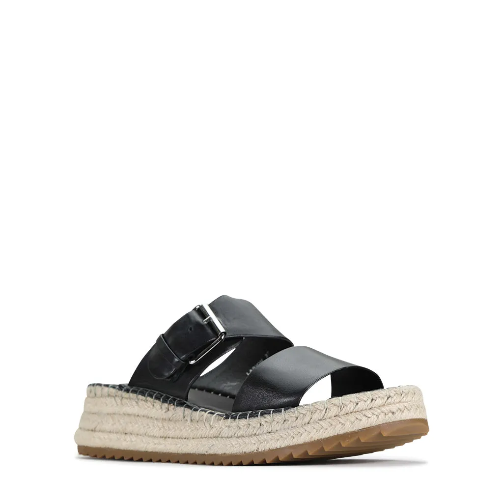 Larion Boucles en Cuir Slides