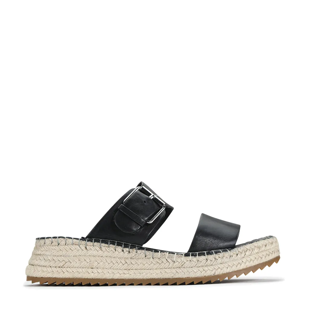Larion Boucles en Cuir Slides