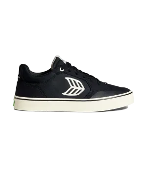 Les chaussures de skate Vallely en noir et ivoire