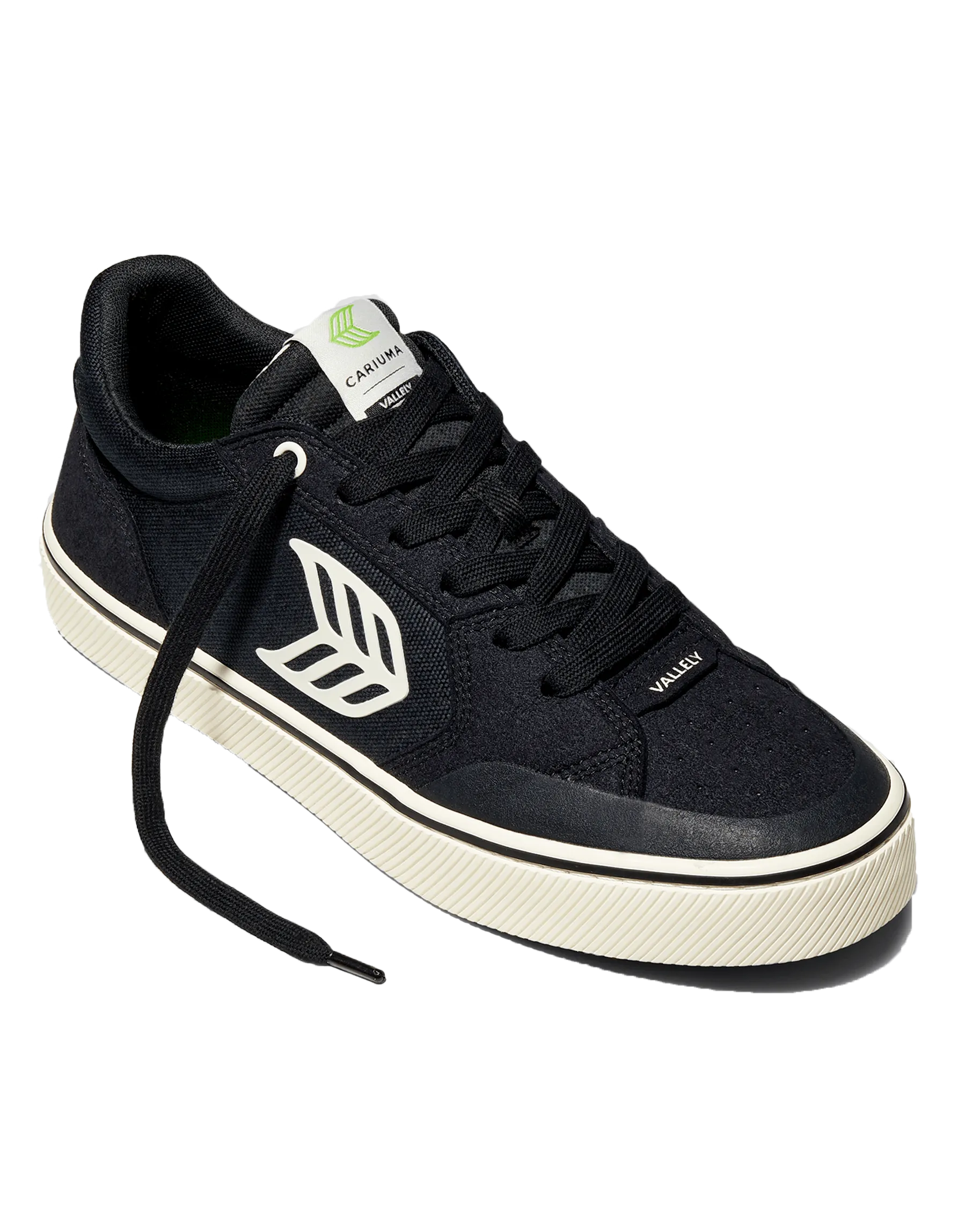 Les chaussures de skate Vallely en noir et ivoire